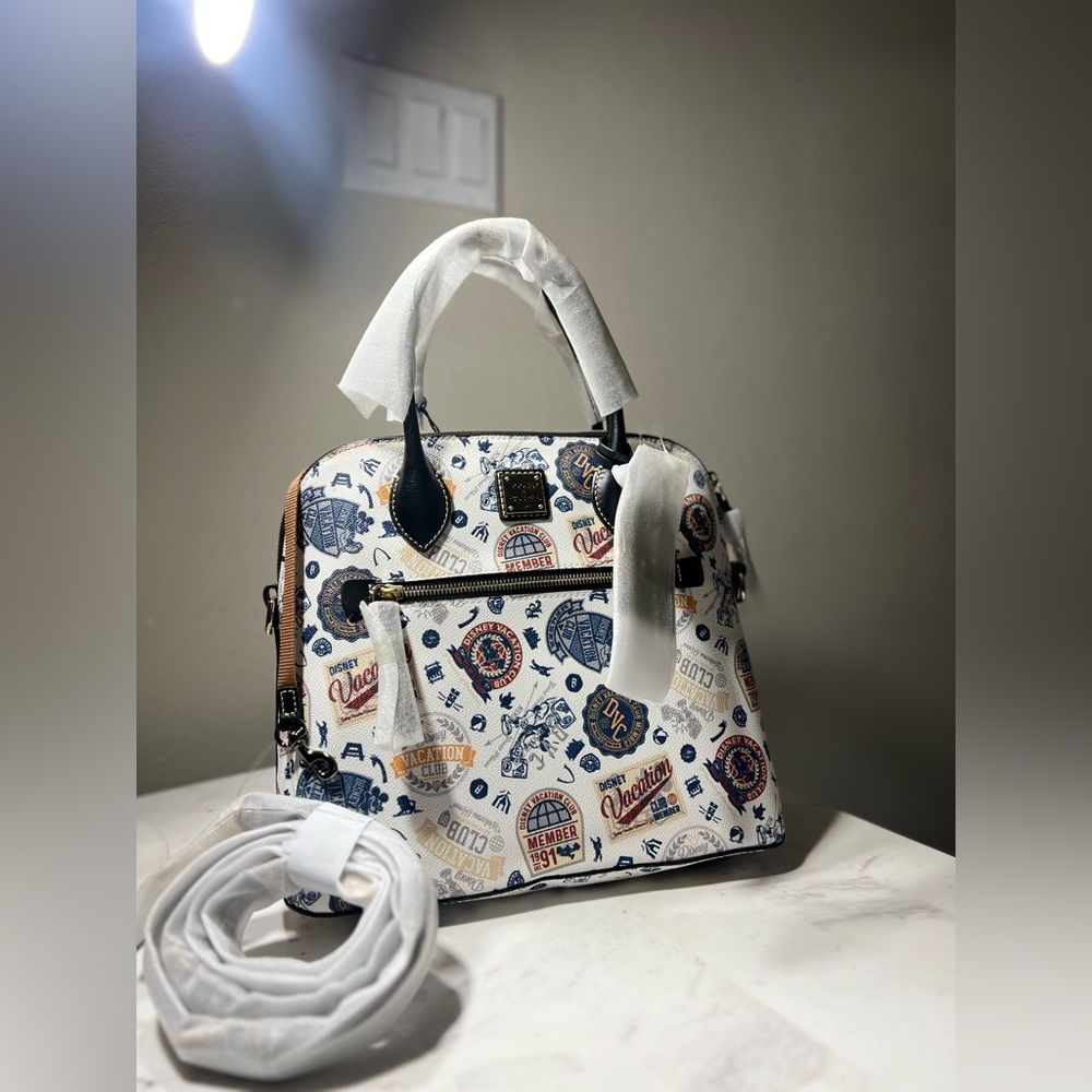New!! Dooney& bourke Disney Vacation club, new tags, perfect size!!